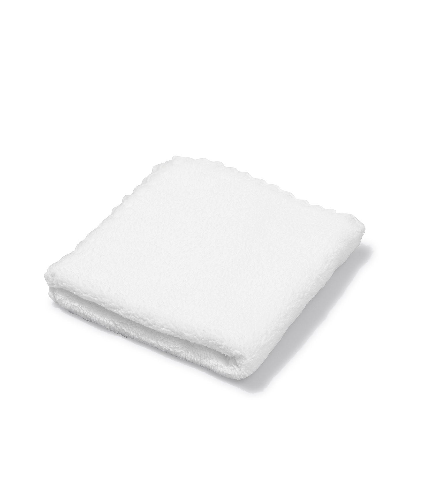 Folded white face cloth