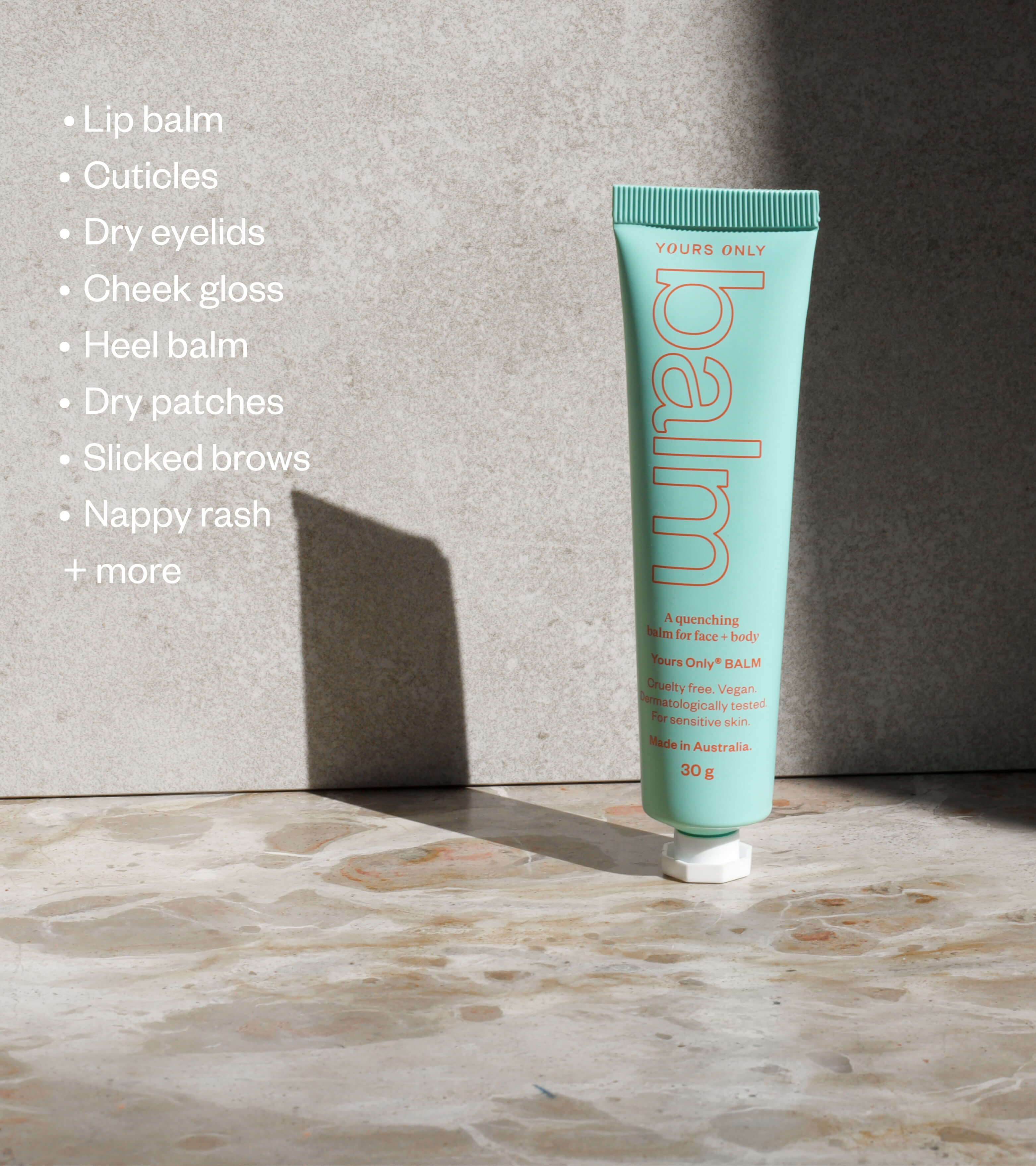 Lip + body balm 30g tube with text list of uses: lip balm, cuticles, dry eyelids, cheek gloss, heel balm