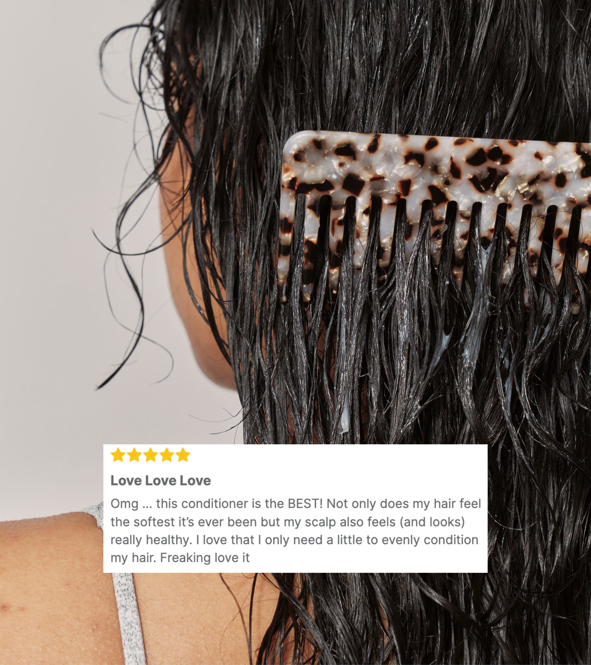 Hair 100mL bundle being combed through wet hair with a tortoiseshell comb