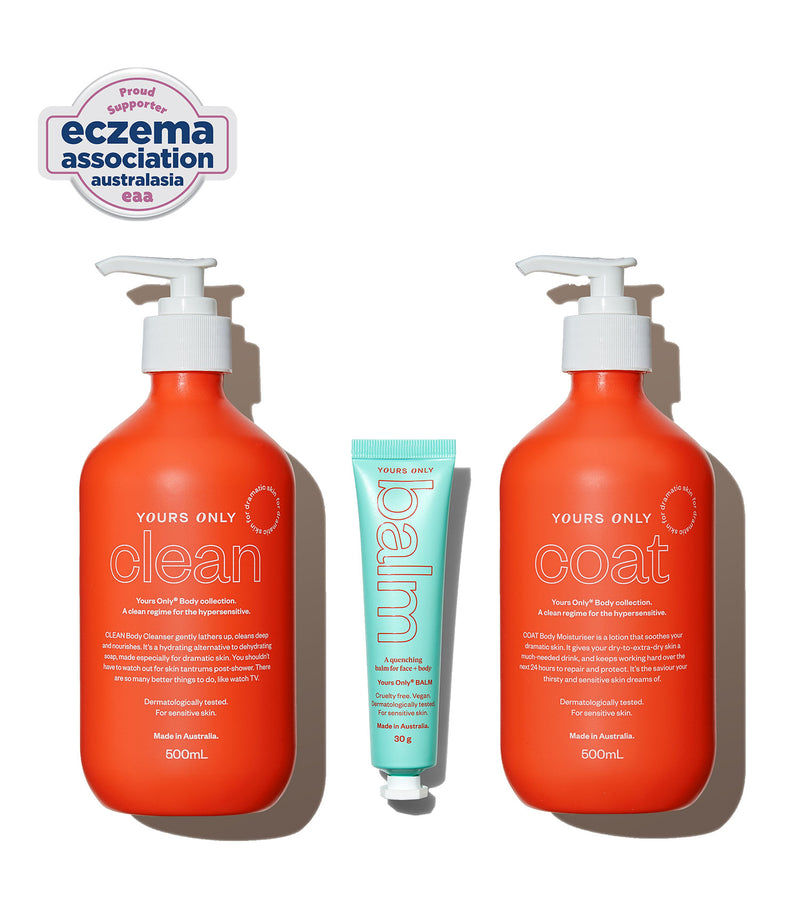 Two orange bottles labeled 'clean' and 'coat' with a smaller blue tube in the center, on a white background with Eczema Association Australasia logo.
