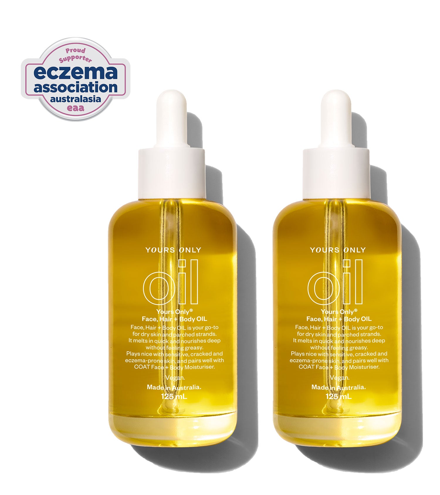 Two 125mL bottles of Yours Only Face, Hair + Body Oil with Eczema Association Australasia logo